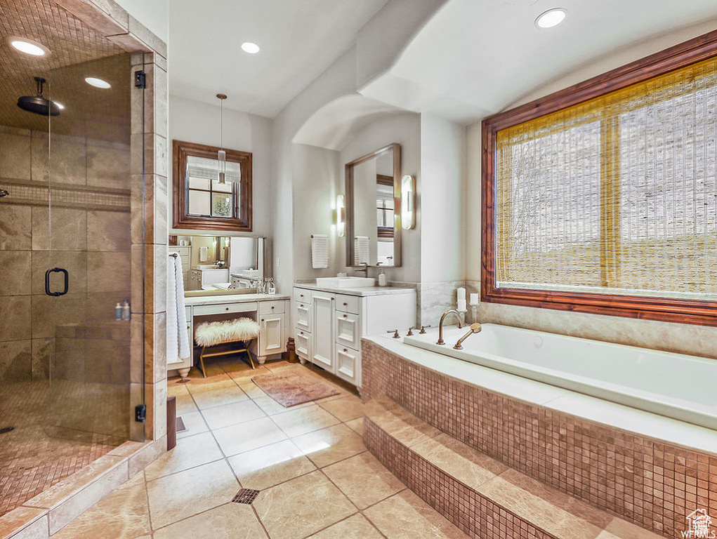 Bathroom featuring vanity, recessed lighting, tile patterned floors, a stall shower, and a bath
