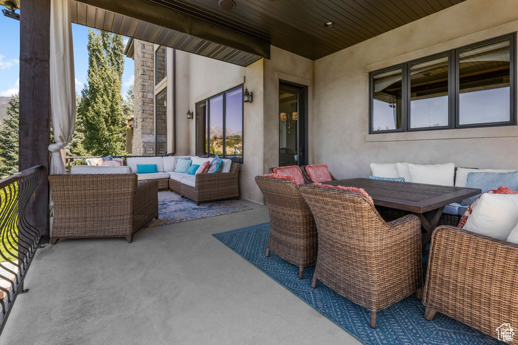 View of patio with an outdoor living space