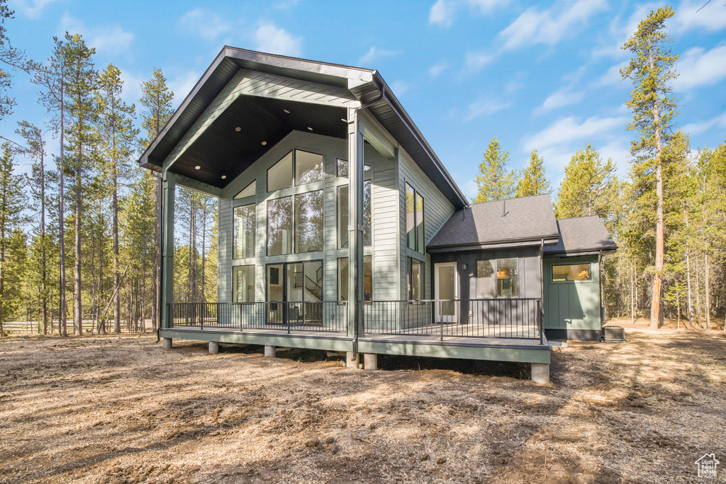 Rear view of house with a deck