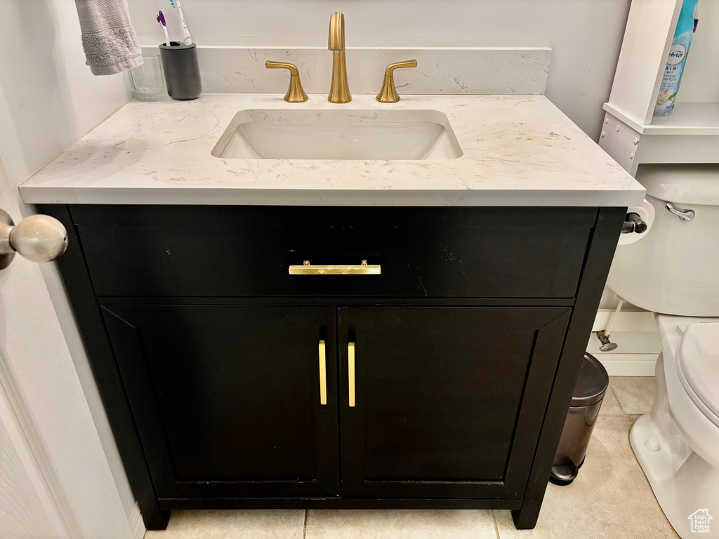 Bathroom with vanity and toilet