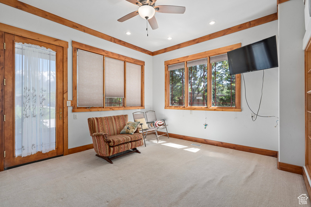 Sitting room featuring baseboards, carpet flooring, a ceiling fan, and recessed lighting