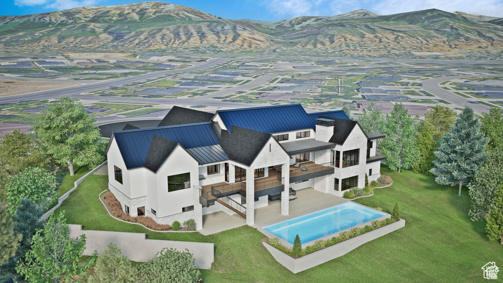 View of subject property with mountains