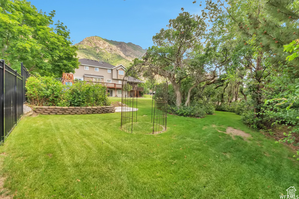 View of yard with a mountain view
