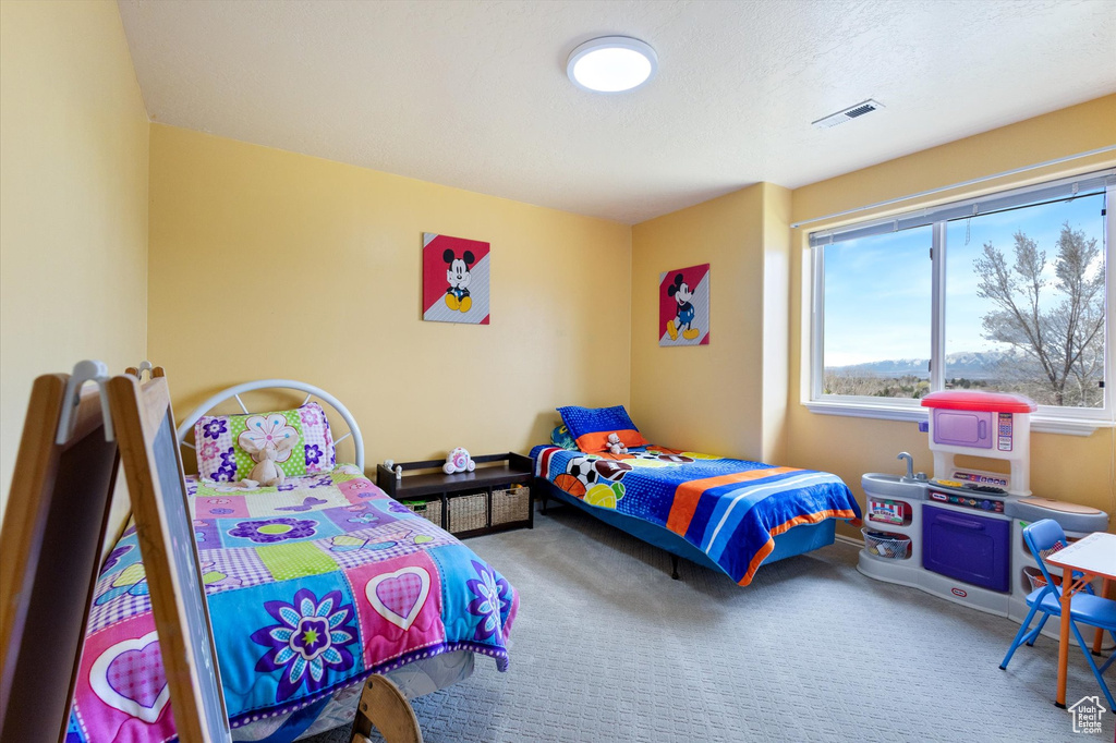 Bedroom featuring carpet floors