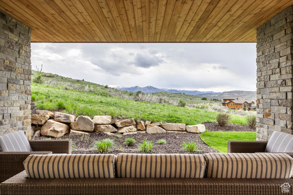 View of patio / terrace with a mountain view