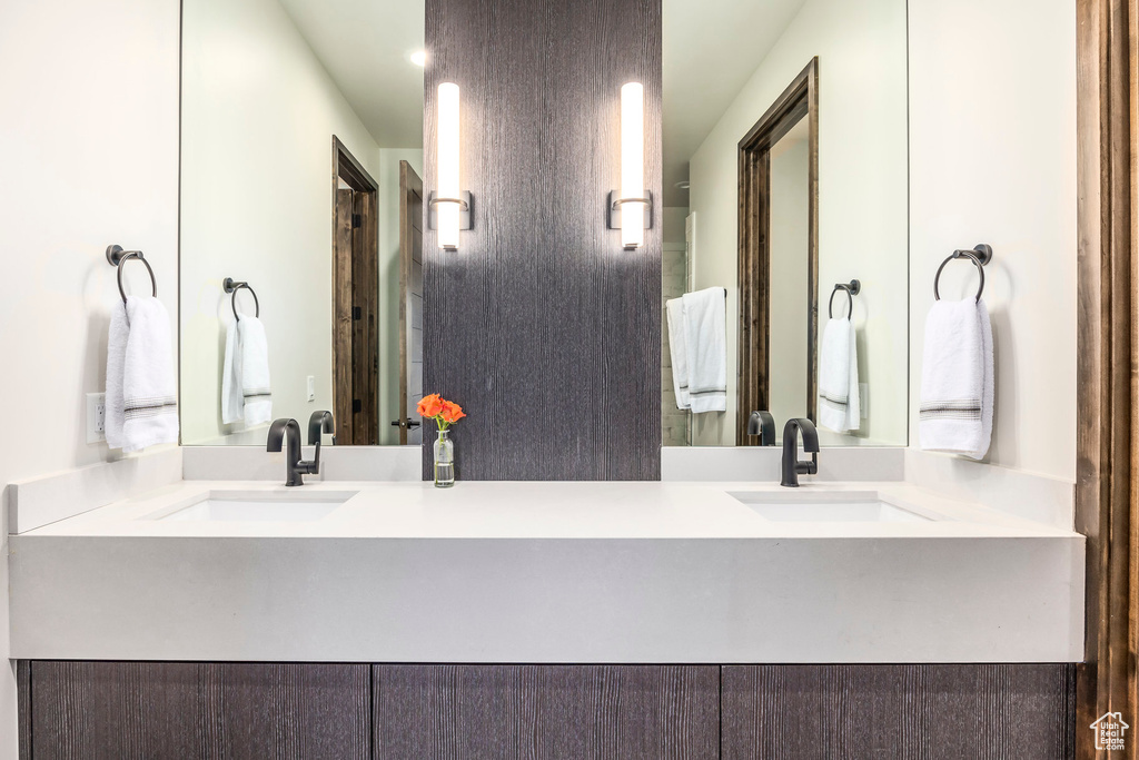 Full bathroom featuring double vanity