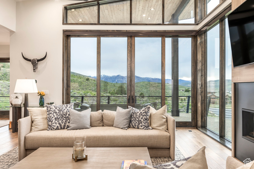 Living room featuring light wood-style flooring and french doors