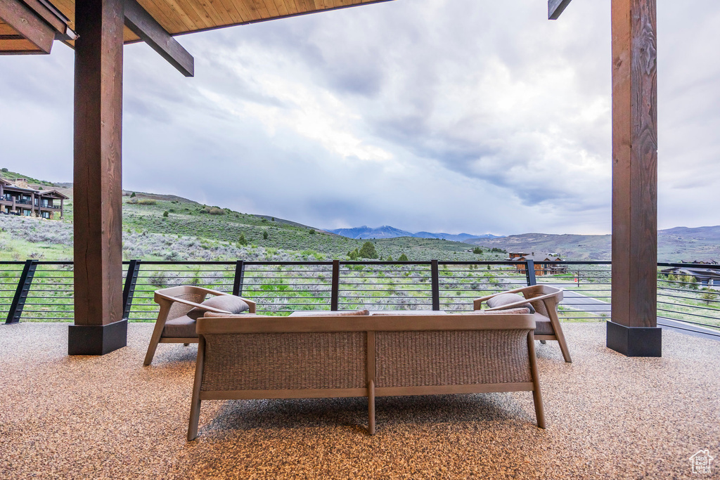 View of patio / terrace with a mountain view
