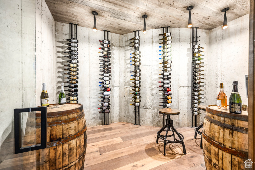 Wine room with wood finished floors