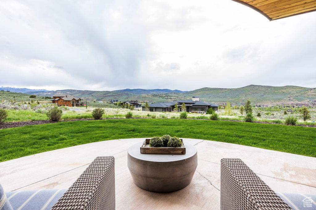 View of patio with a mountain view