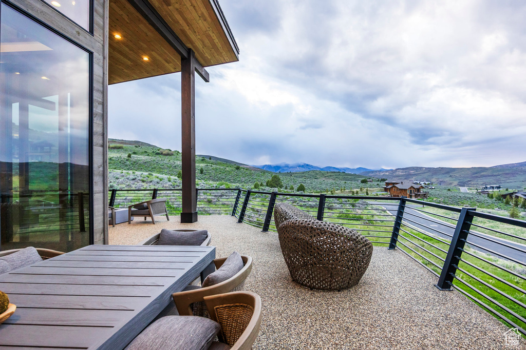 Balcony featuring a mountain view