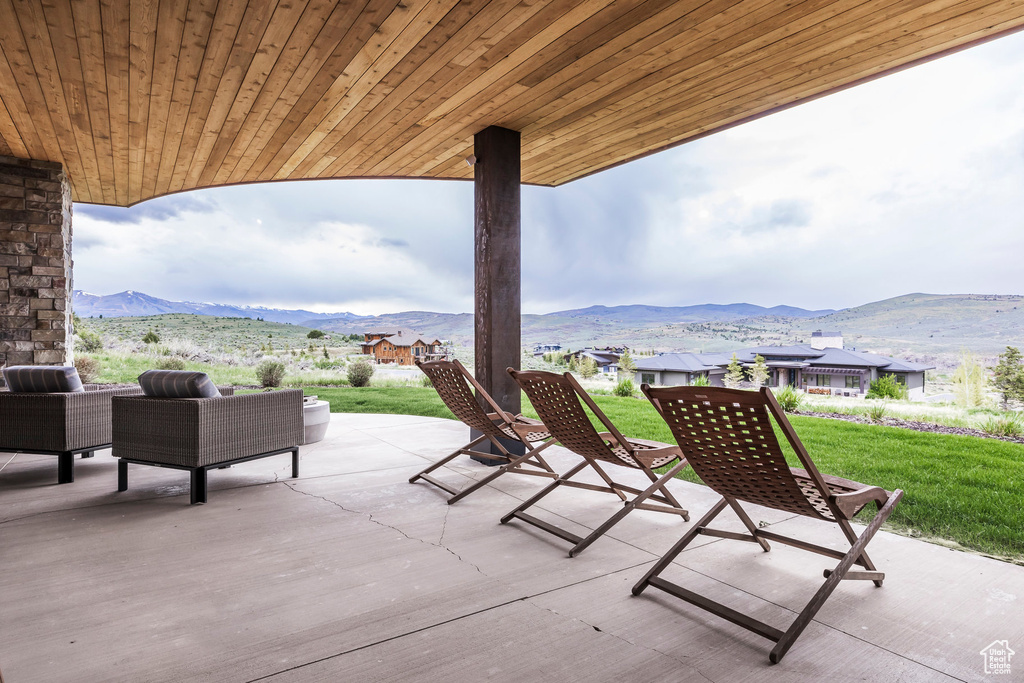 View of patio featuring a mountain view