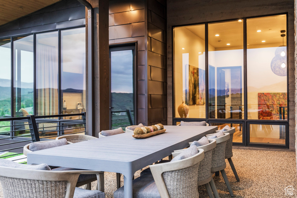 View of patio / terrace featuring outdoor dining area and a balcony
