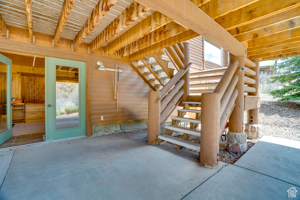 View of patio featuring stairway