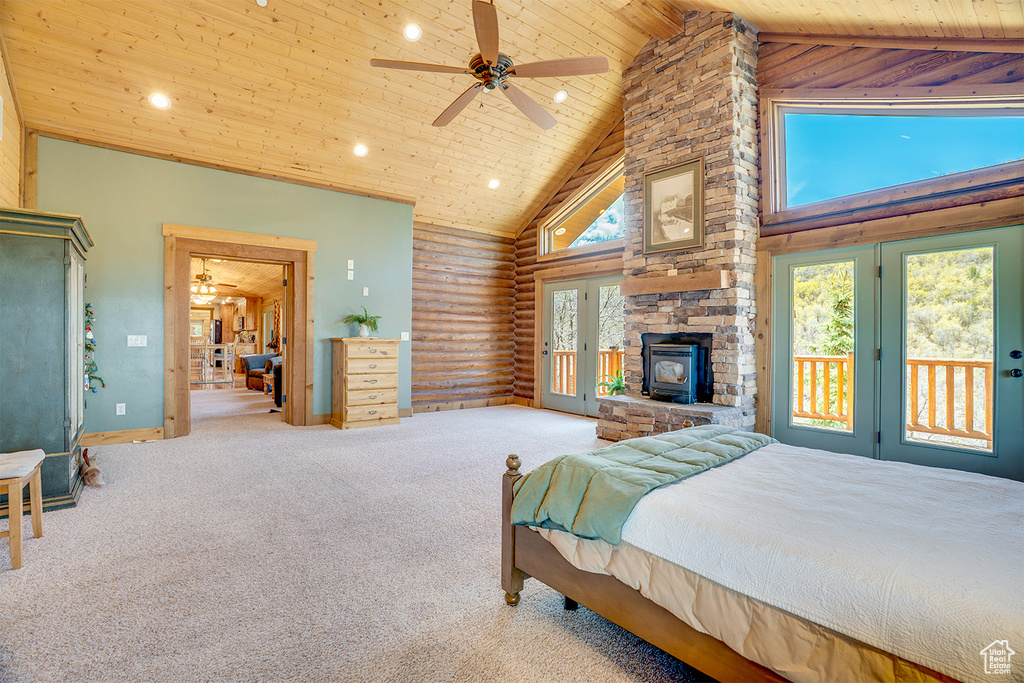 Bedroom featuring access to outside, wooden ceiling, high vaulted ceiling, carpet flooring, and recessed lighting
