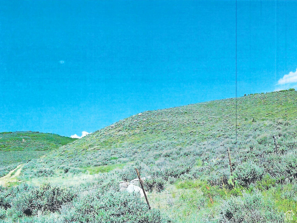 Property view of water with a mountain view