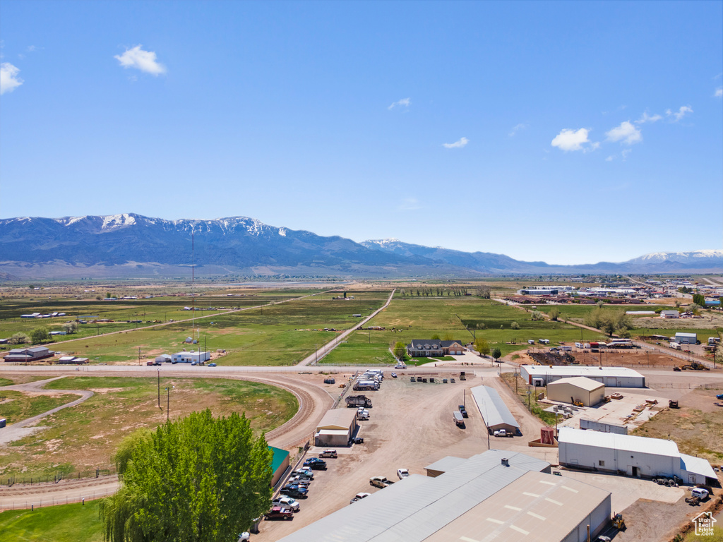 Aerial view of sparsely populated area featuring a mountainous background