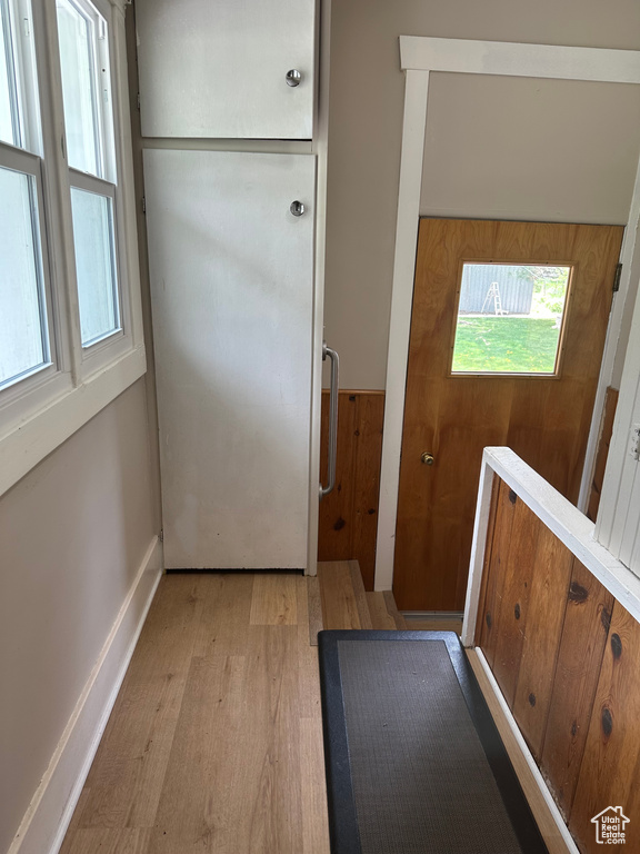 Doorway to outside featuring light wood finished floors