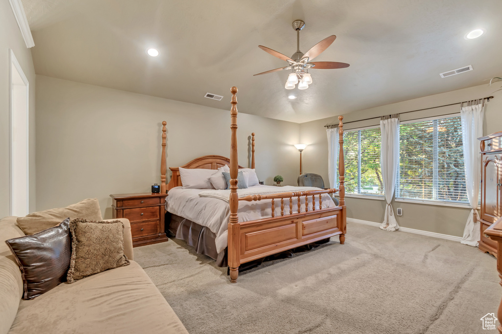 Bedroom featuring baseboards, recessed lighting, light colored carpet, and ceiling fan