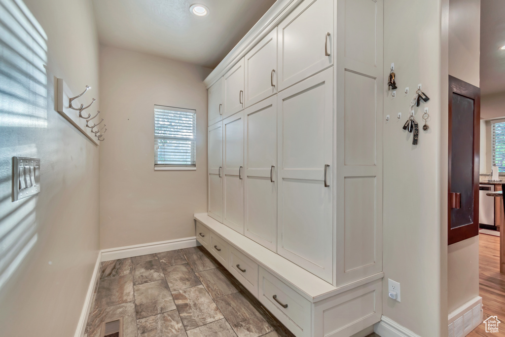 Mudroom featuring baseboards