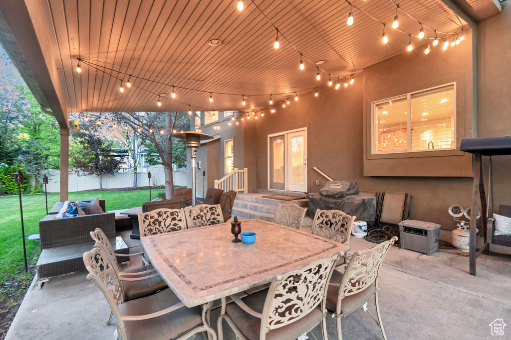 View of patio with an outdoor hangout area and outdoor dining area