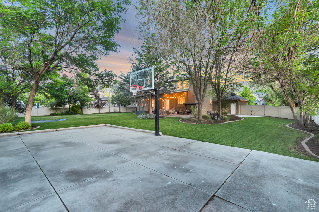 View of sport court featuring basketball hoop