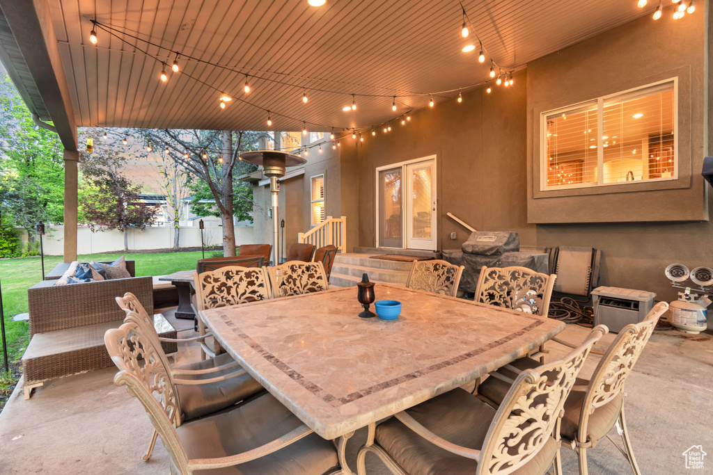 View of patio with outdoor lounge area and outdoor dining space