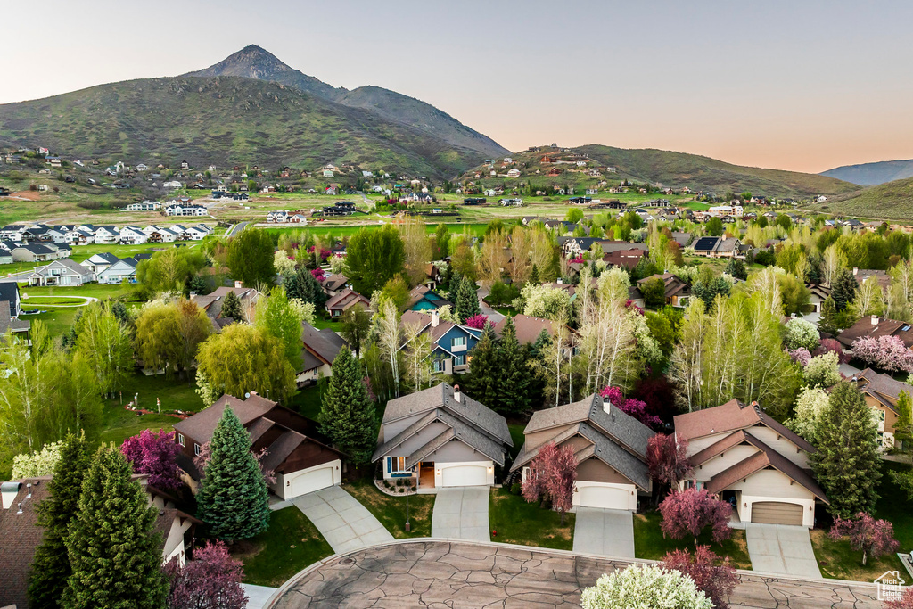 Aerial view of residential area with a mountain backdrop