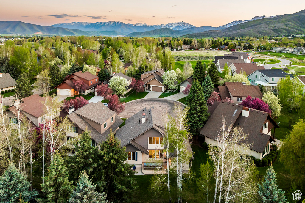 Aerial view at dusk of a mountain view and a residential view