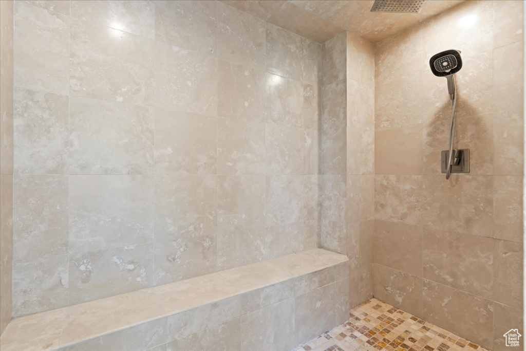 Bathroom with a tile shower