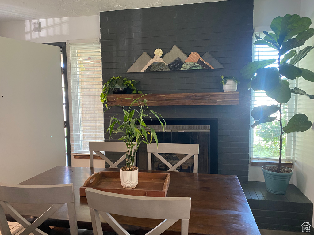 Dining space featuring a fireplace