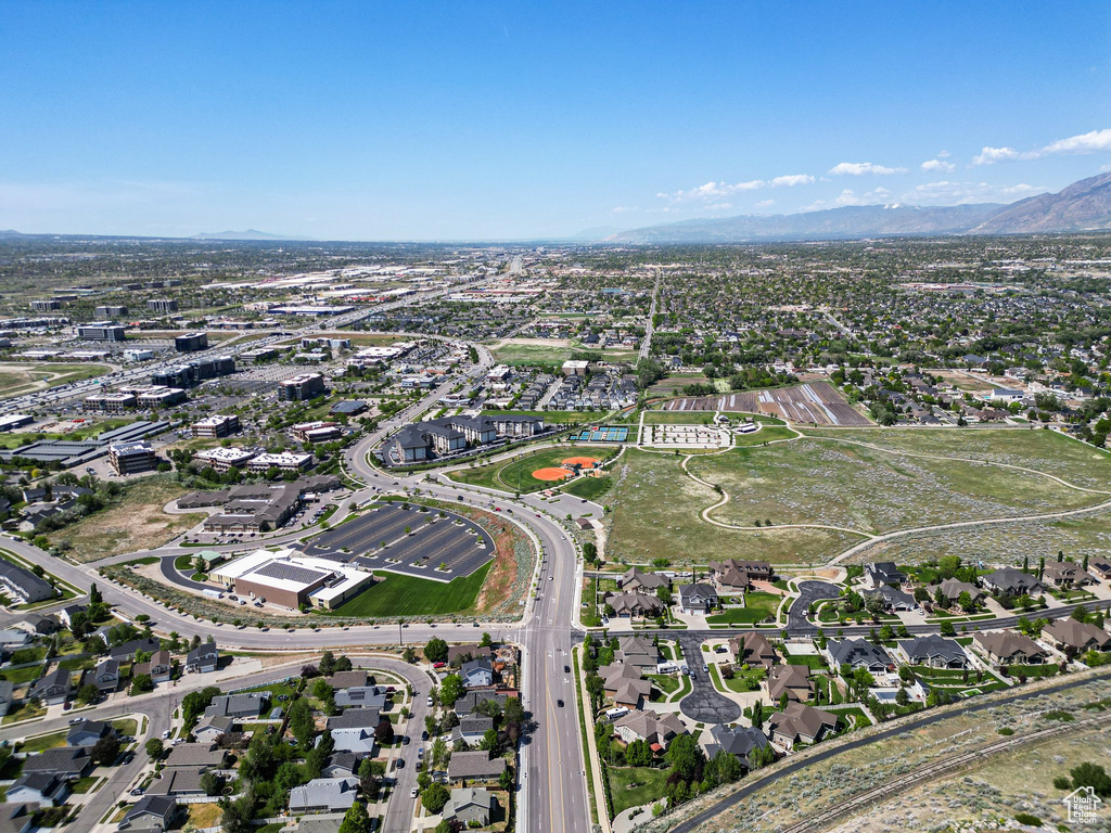 Aerial view of property\\\\\\\\\\\\\\\\\\\\\\\\\\\\\\\\\\\\\\\\\\\\\\\\\\\\\\\\\\\\\\\\\\\\\\\\\\\\\\\\\\\\\\\\\\\\\\\\\\\\\\\\\\\\\\\\\\\\\\\\\\\\\\\'s location with a mountain backdrop and nearby suburban area