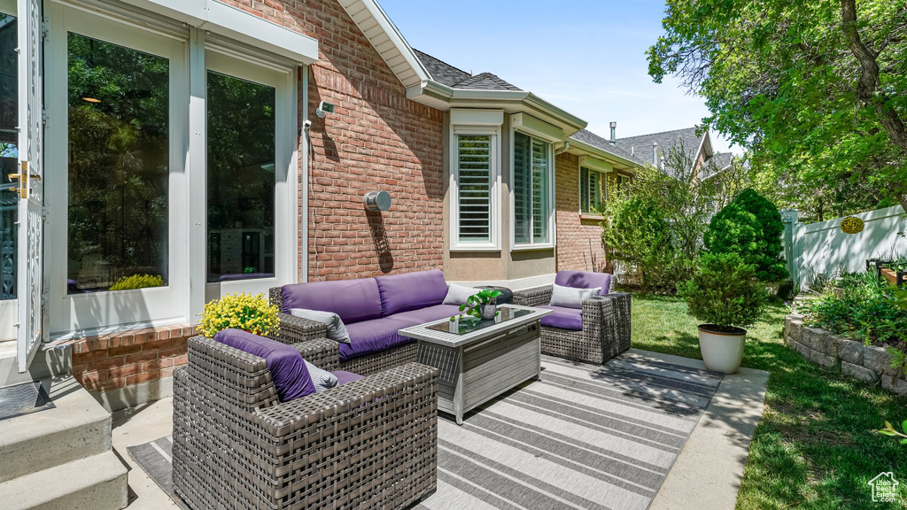 View of patio / terrace with outdoor lounge area and fence