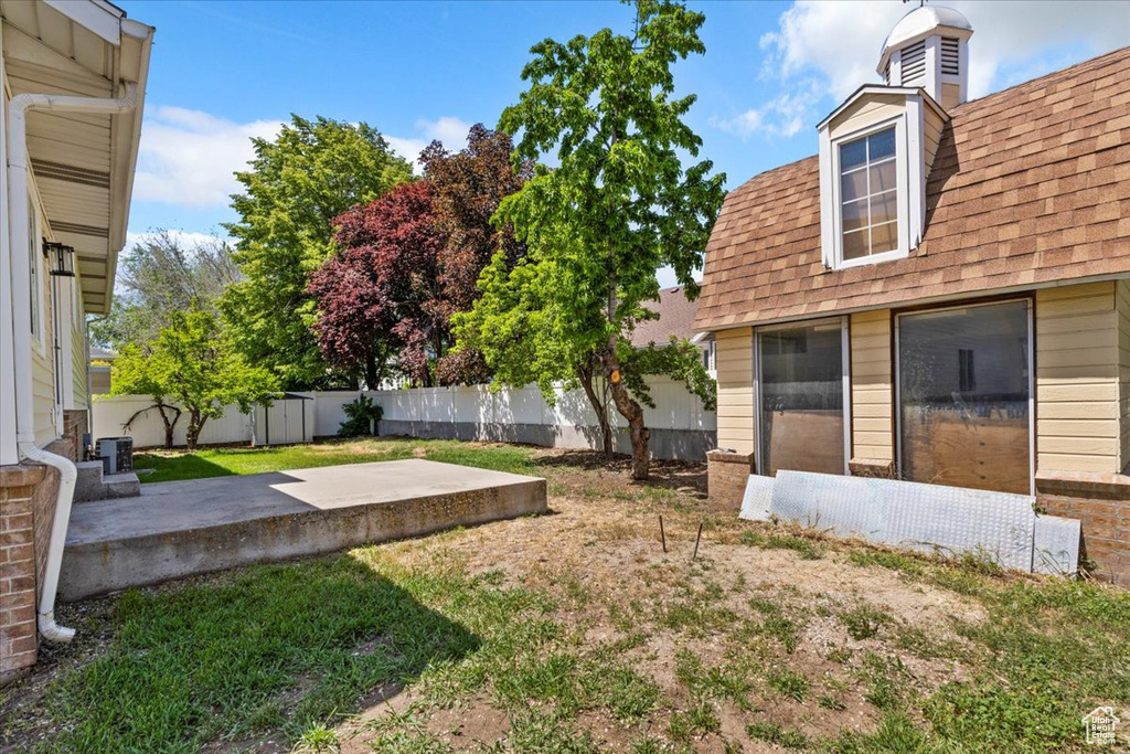 View of yard with a patio area