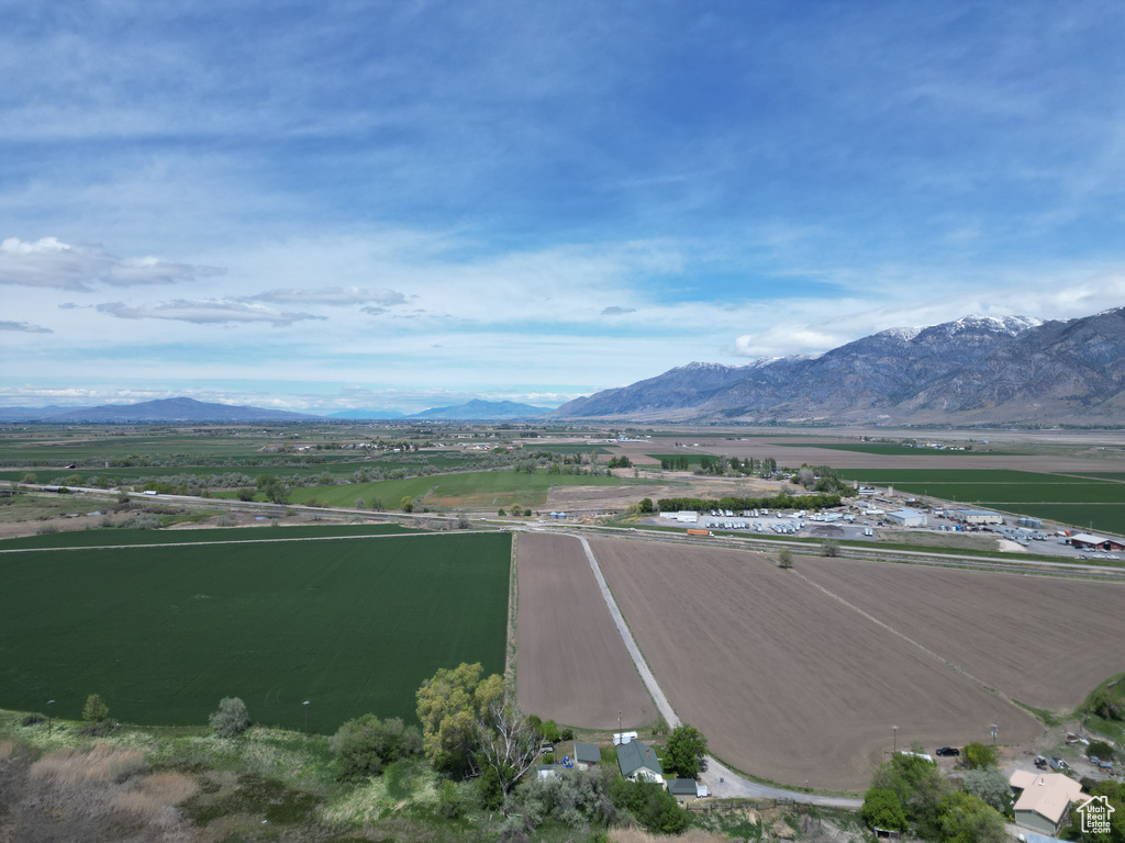 View of mountain background featuring rural landscape