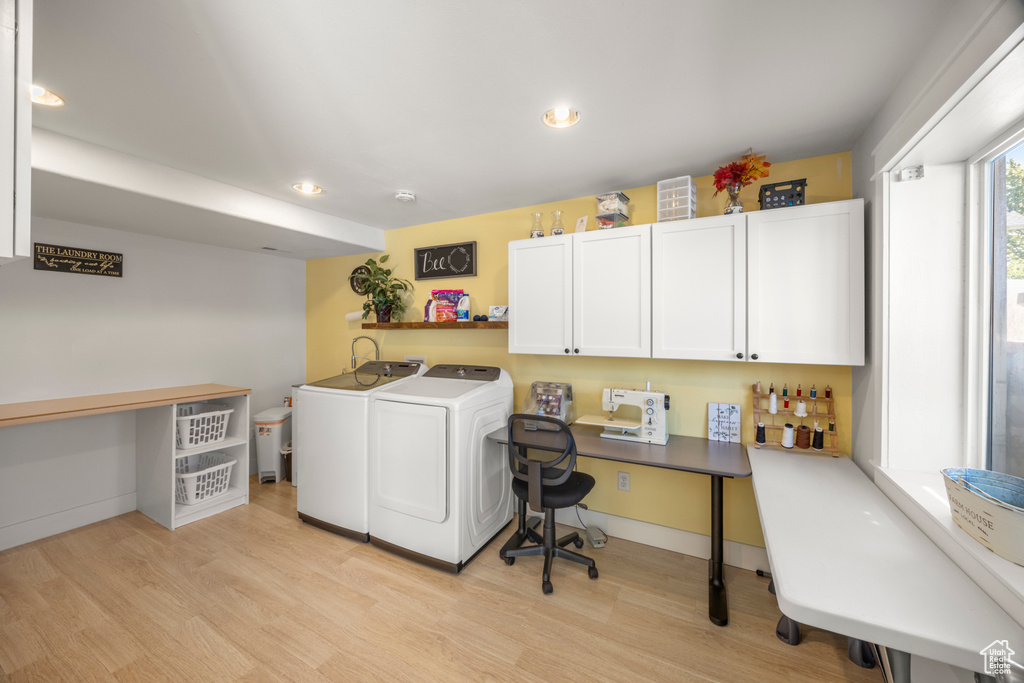 Laundry room featuring washing machine and clothes dryer, light wood finished floors, baseboards, recessed lighting, and an office area