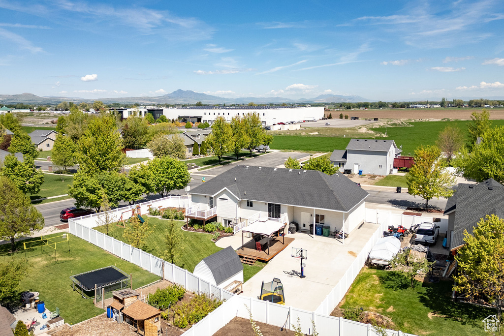 Aerial view of residential area featuring mountains