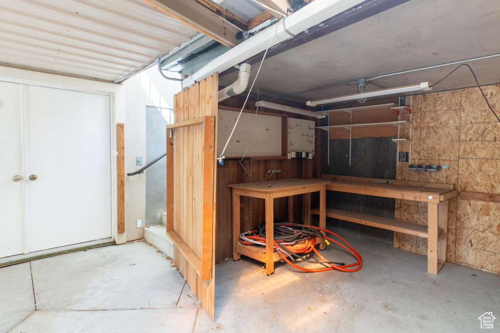 Below grade area with a workshop area