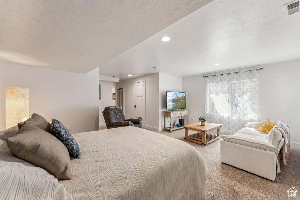 Bedroom with carpet, recessed lighting, and baseboards