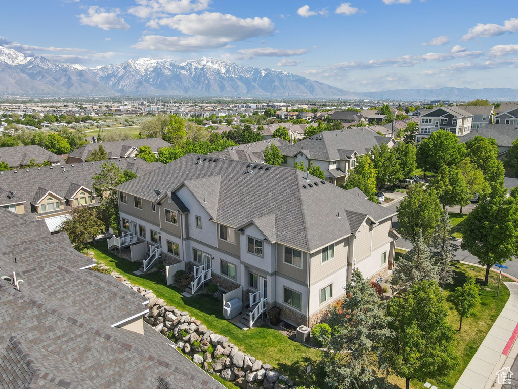 Aerial view of residential area with mountains