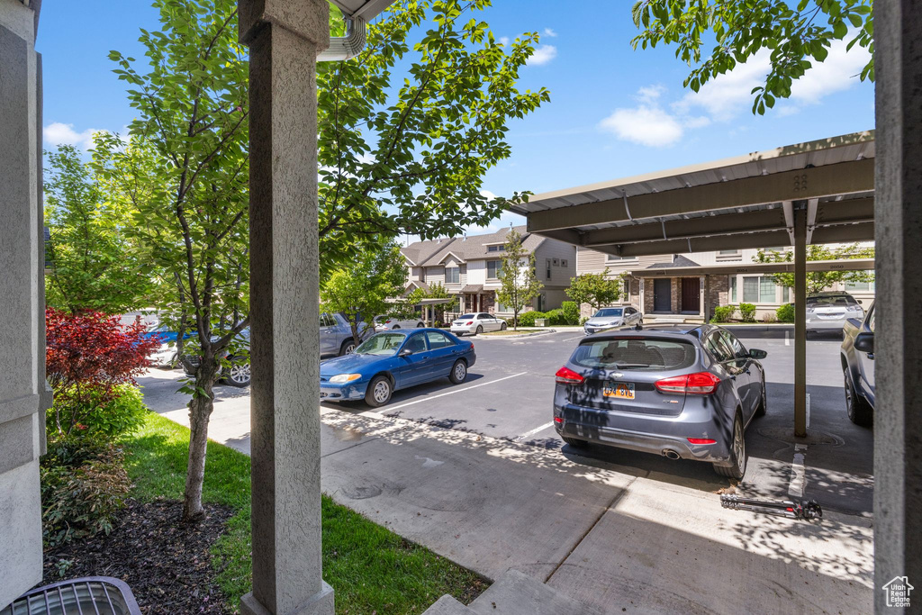 Uncovered parking lot with a residential view