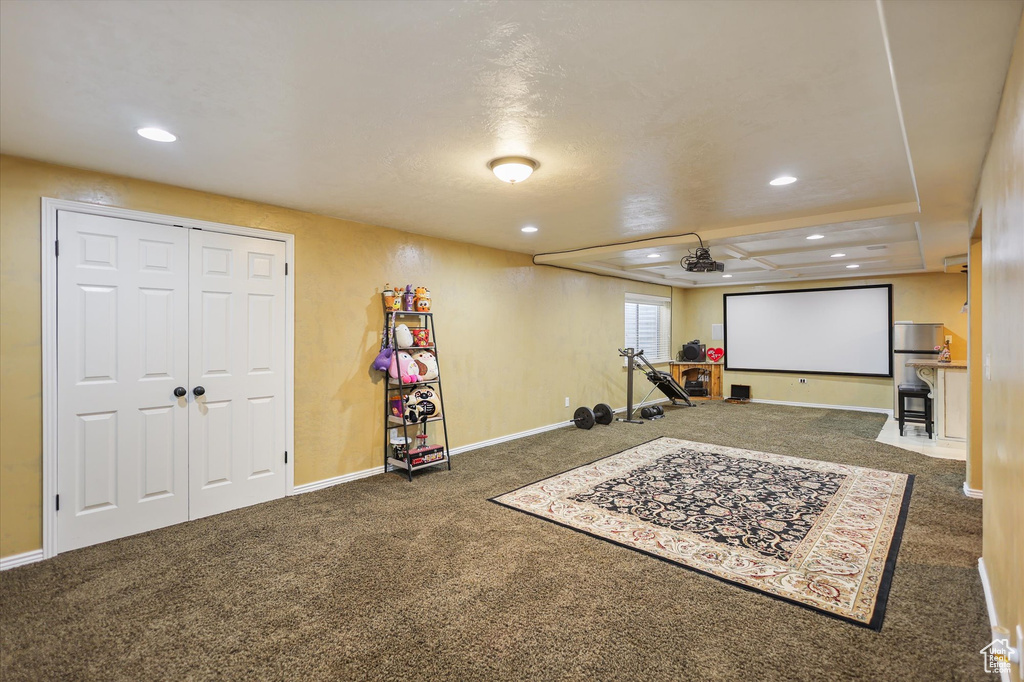 Cinema room featuring carpet, recessed lighting, and baseboards