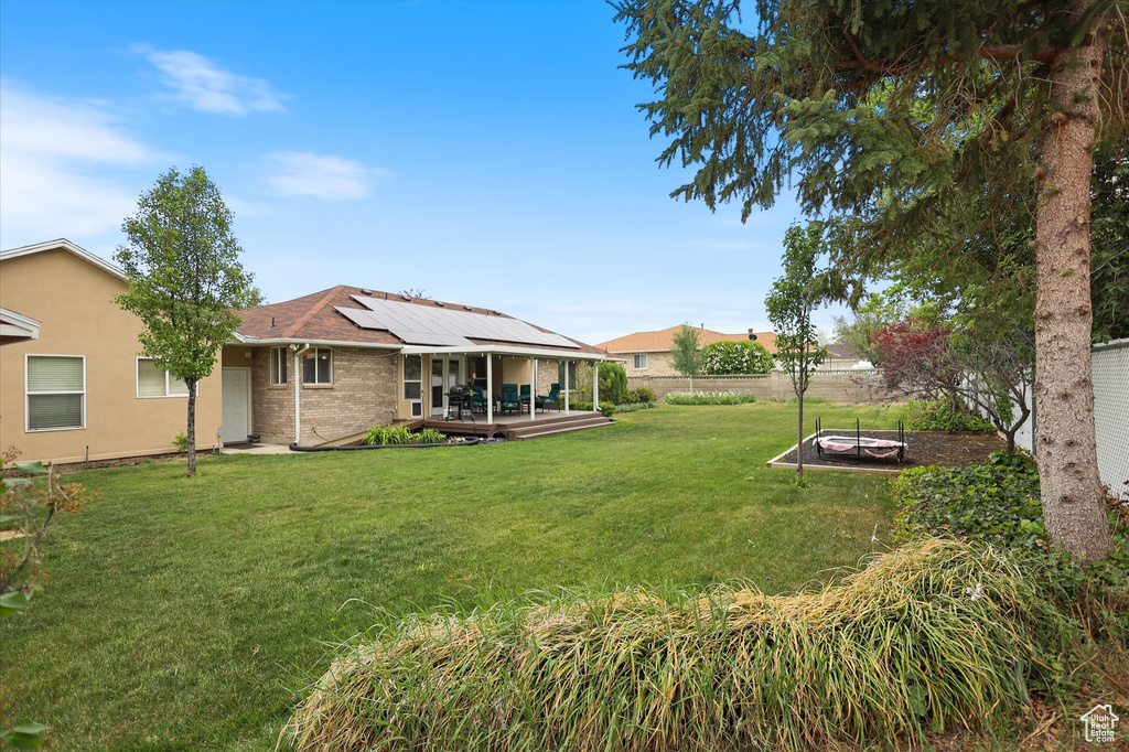 View of yard featuring a deck