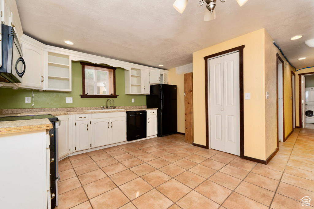 Kitchen featuring open shelves, black appliances, light tile patterned flooring, white cabinets, and recessed lighting