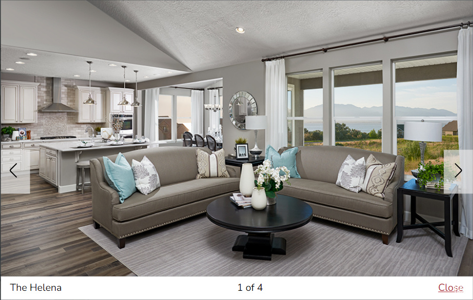 Living room with healthy amount of natural light, recessed lighting, dark wood-style flooring, a mountain view, and vaulted ceiling