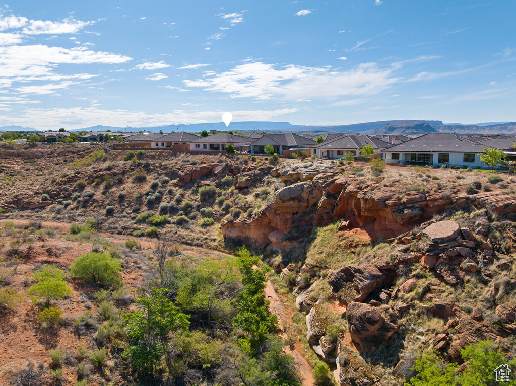 View of mountain backdrop with nearby suburban area