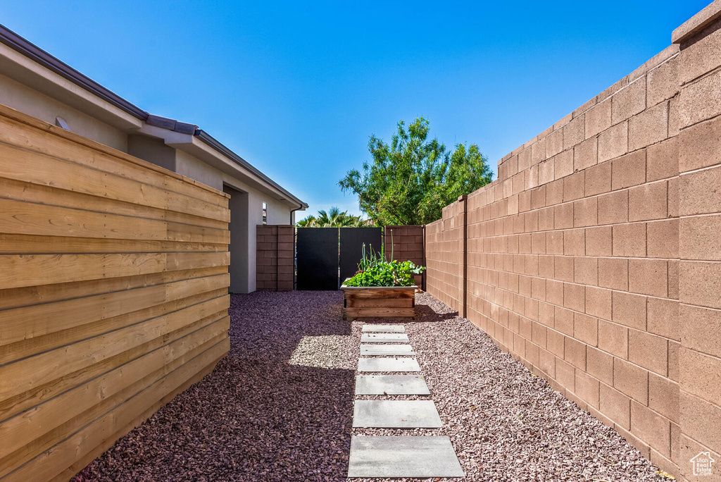 View of yard with fence