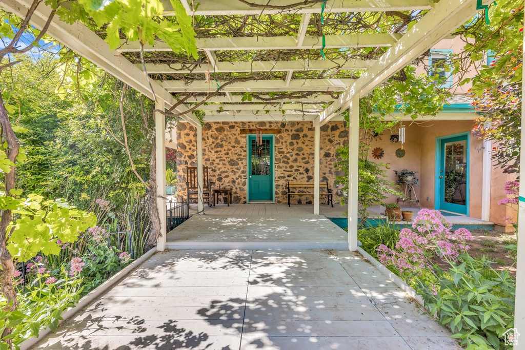 View of patio with a pergola