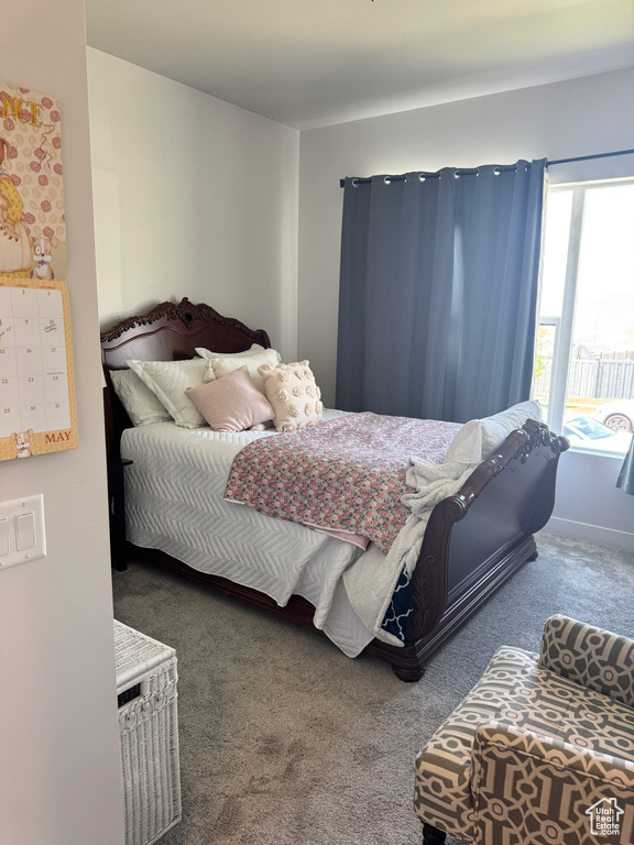 Bedroom with carpet