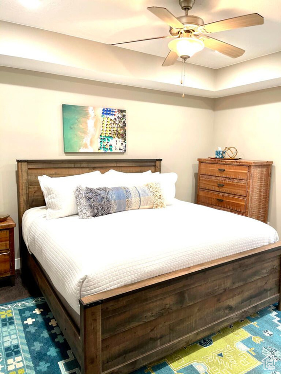 Bedroom featuring a ceiling fan